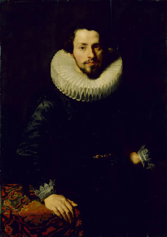 एक आदमी का पोर्ट्रेट एक मेज़ पर - Antoine van Dyck