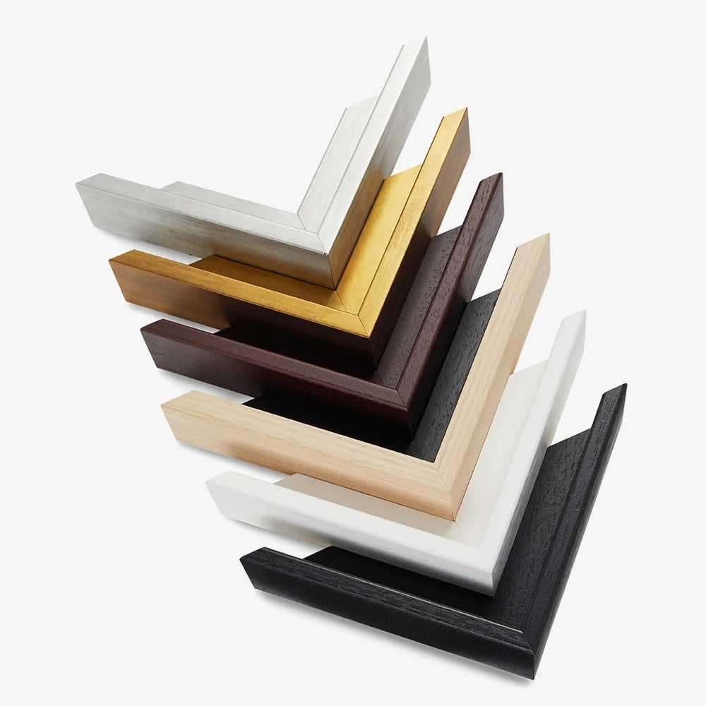 Finitions des cadres flottants : argent, or, brun, bois naturel, blanc et noir.